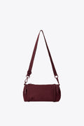 The Expandable Crossbody Charm in Burgundy