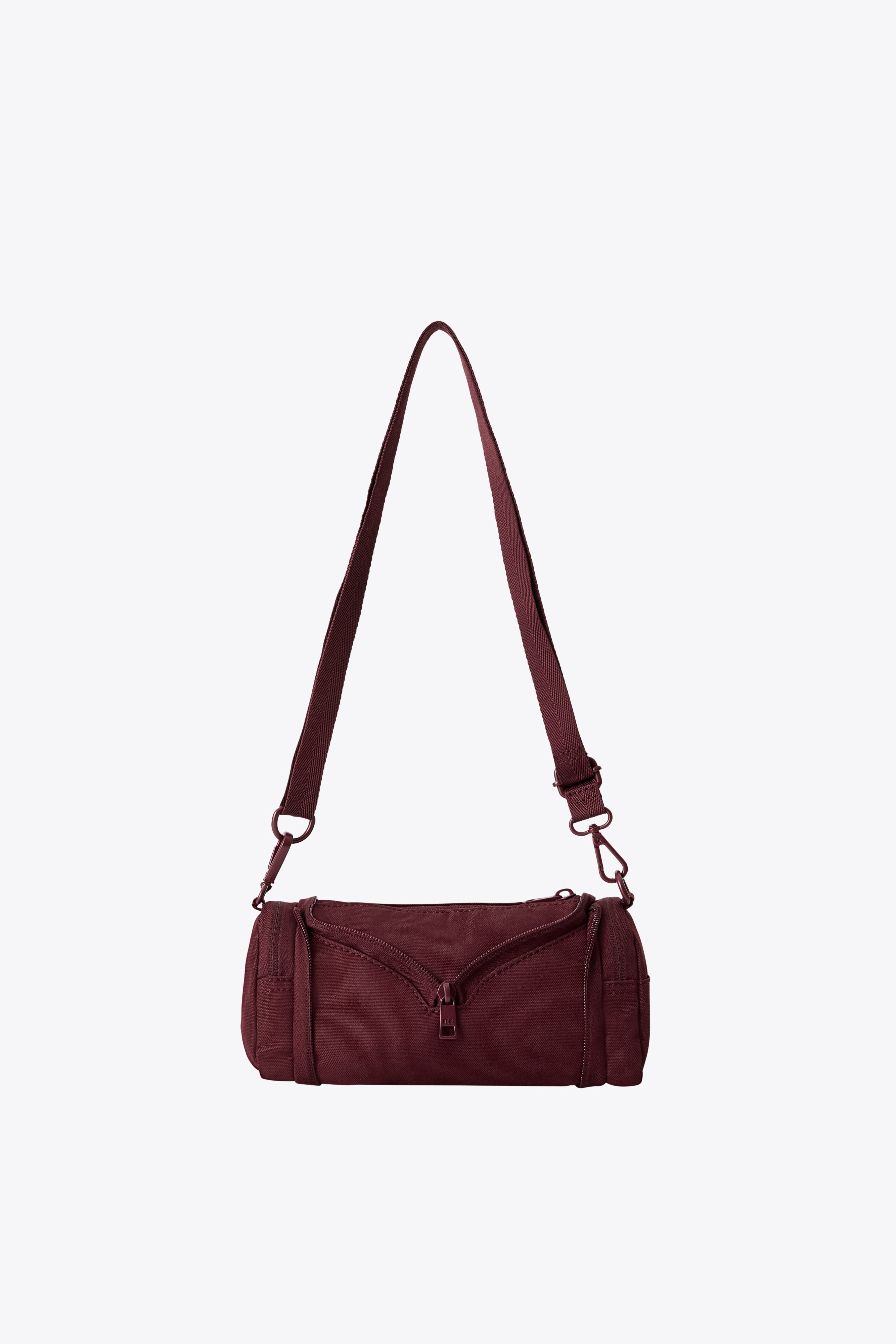 The Expandable Crossbody Charm in Burgundy