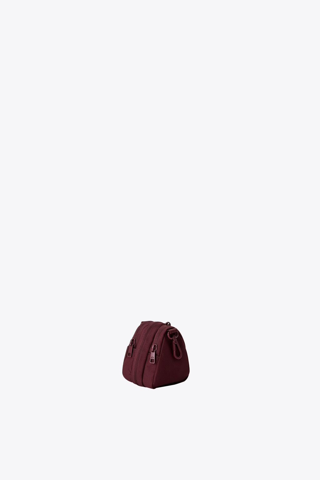 The Expandable Crossbody Charm in Burgundy