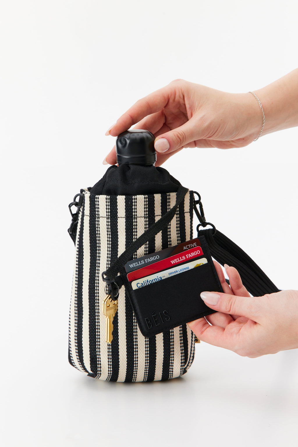 Resale The Water Bottle Crossbody in Black Stripe